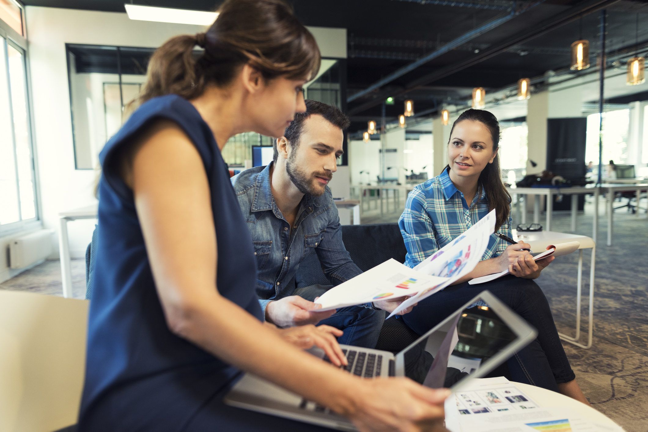 Collaborative teamwork in modern office space.