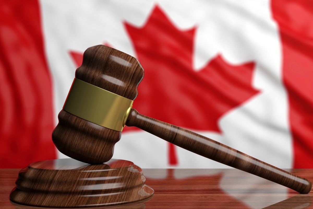 Canadian flag behind gavel