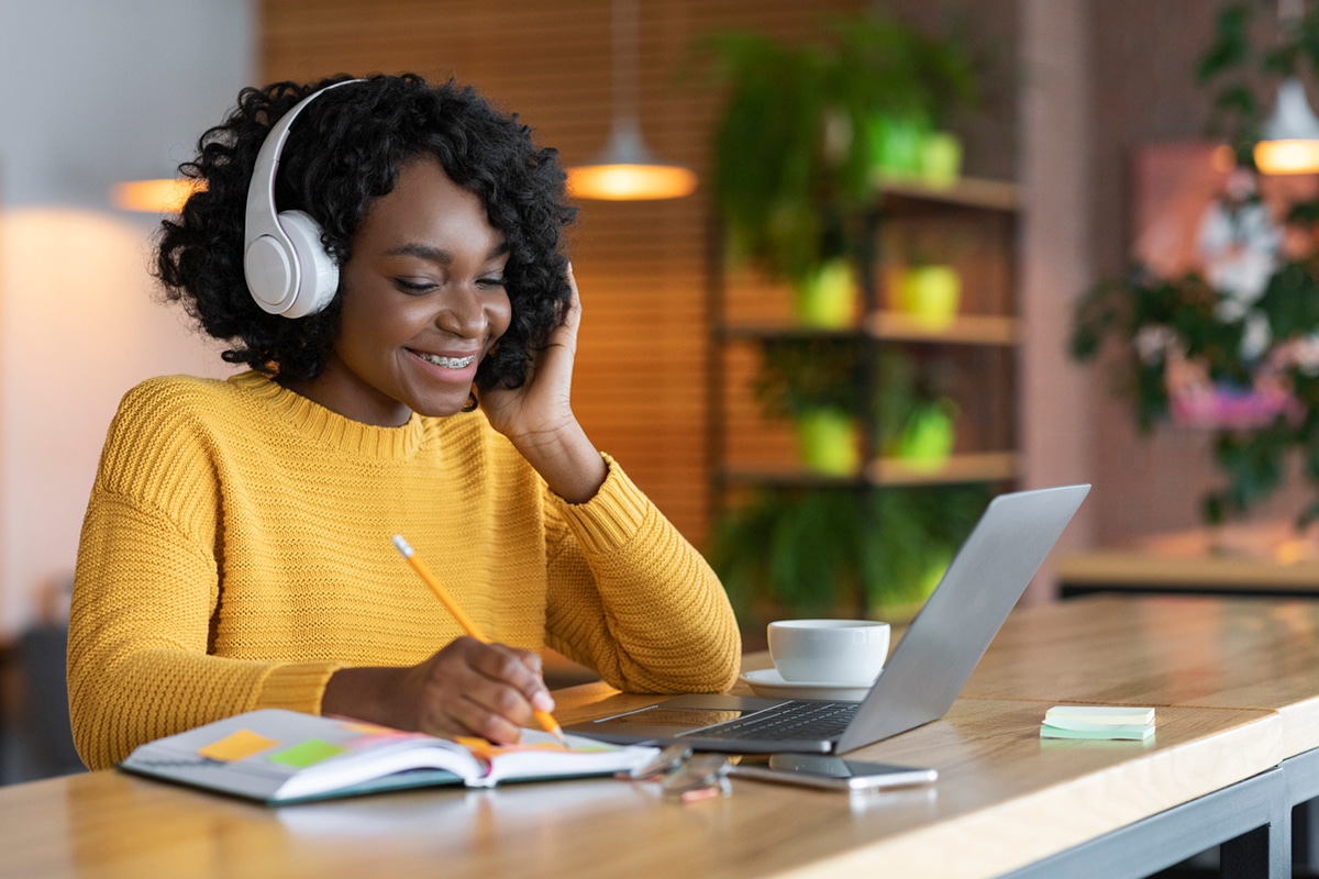 Young woman studying on computer