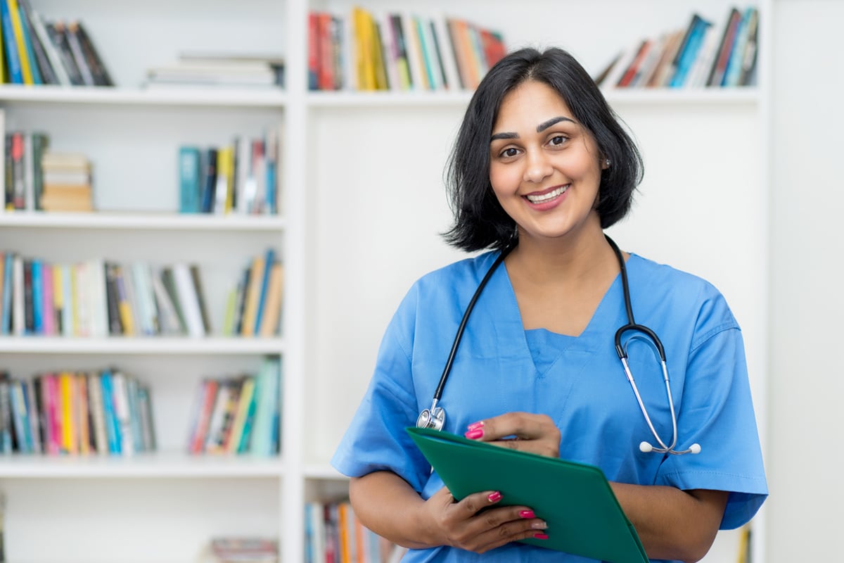 Nurse holding a folder