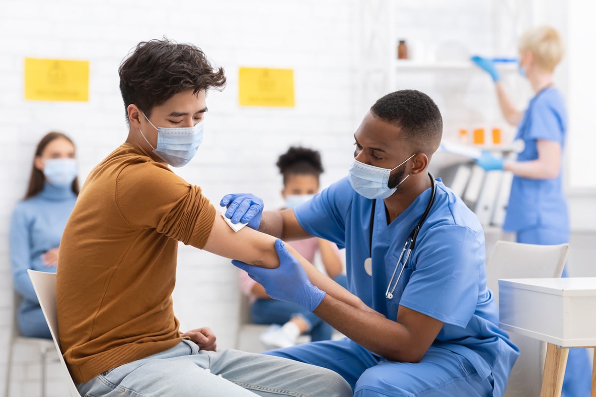 Nurse helping patient