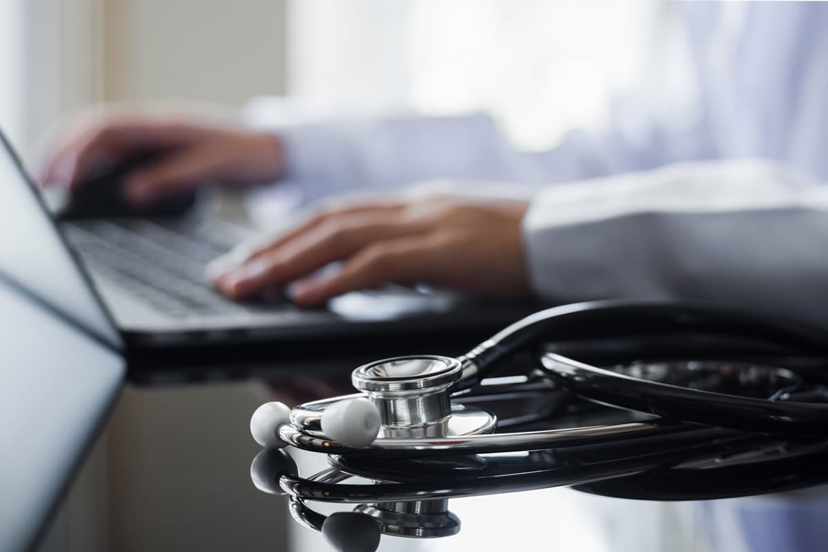Doctor working on computer