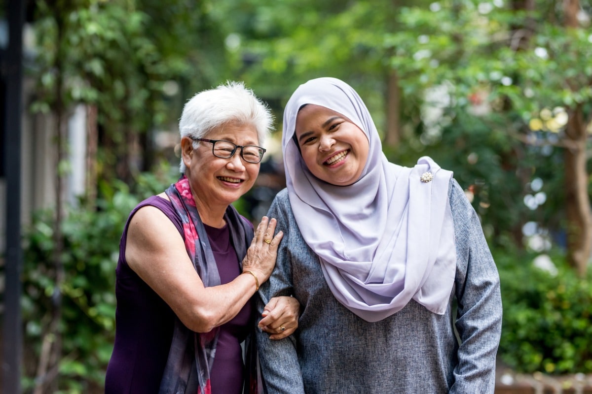 Two friends smiling at camera