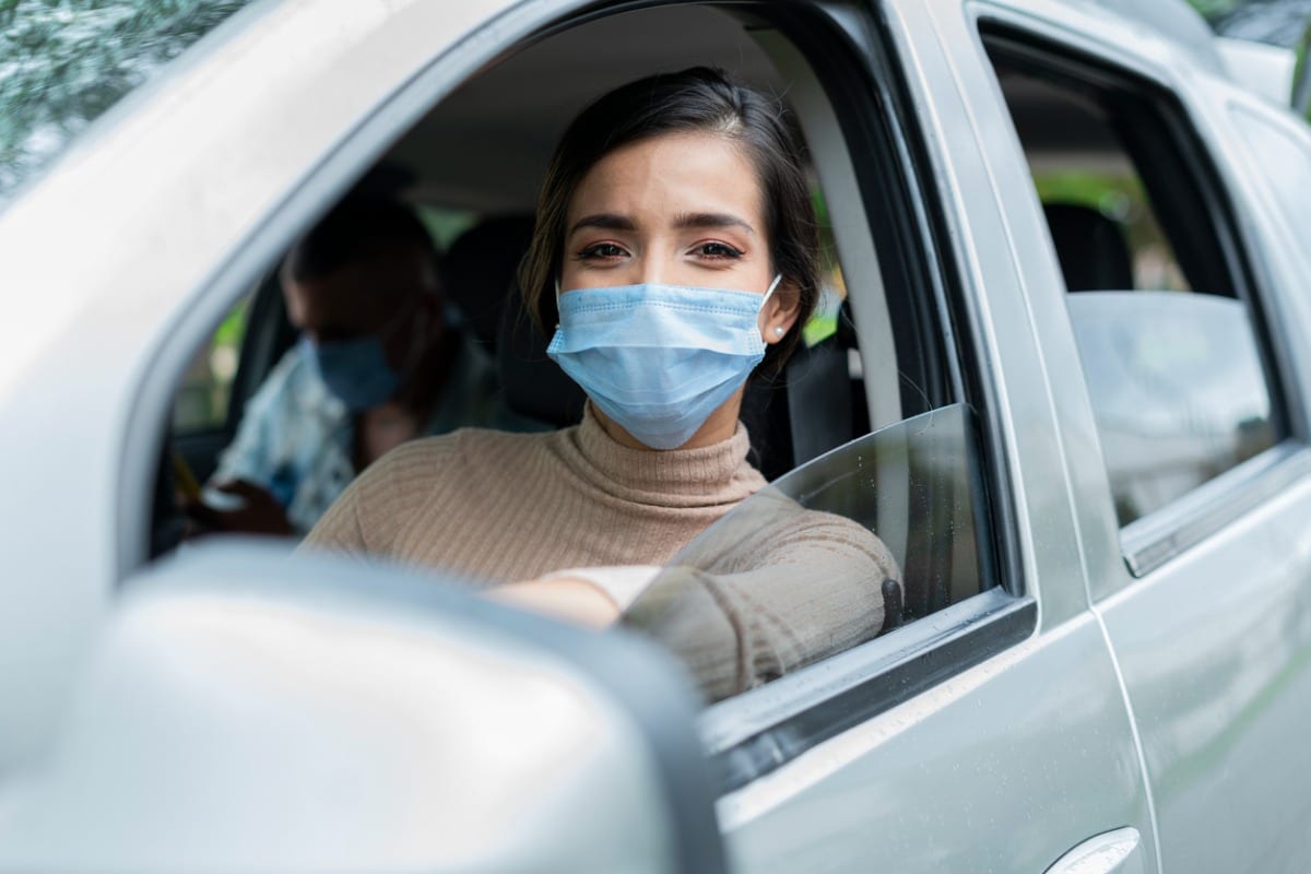 Driver wearing surgical mask