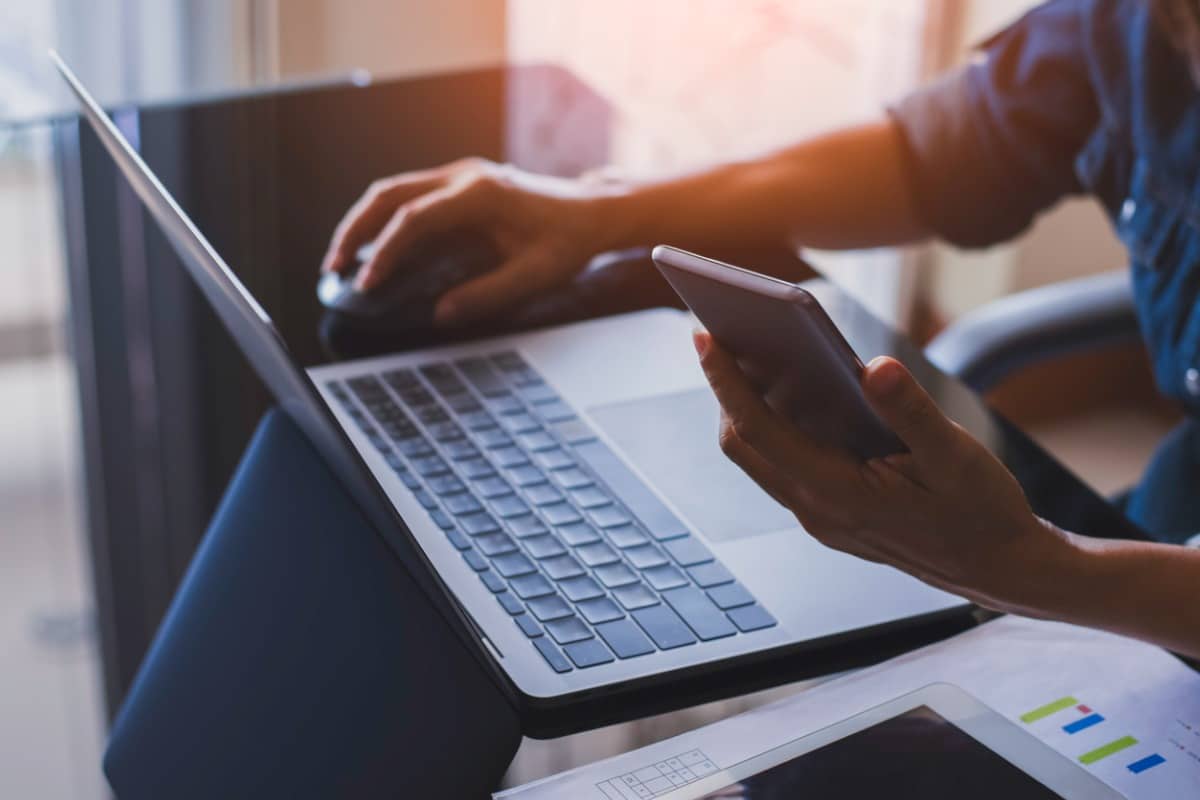 Person typing on computer