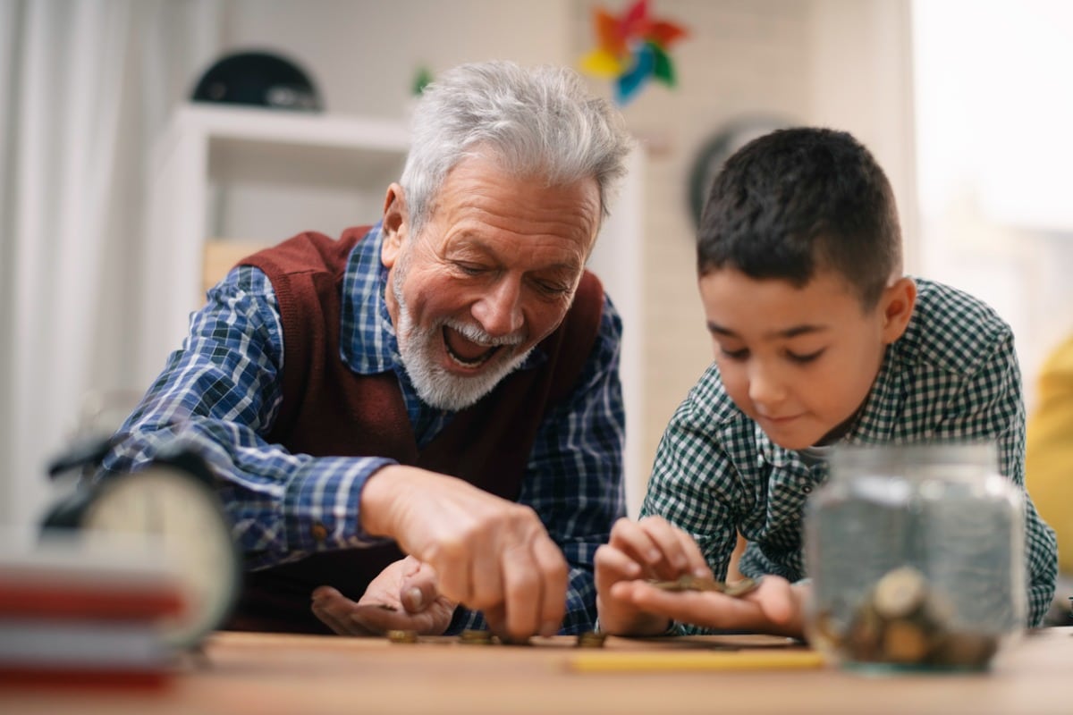 Grandpa and grandson counting money