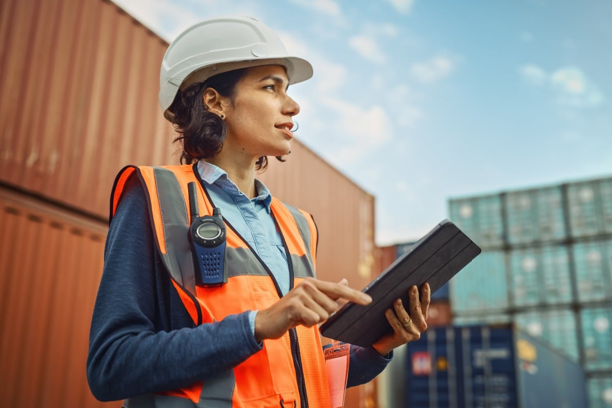 Woman engineer looking to the sky