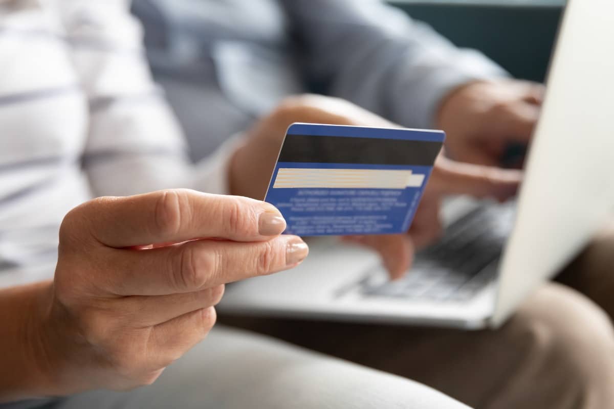 Woman holding credit card