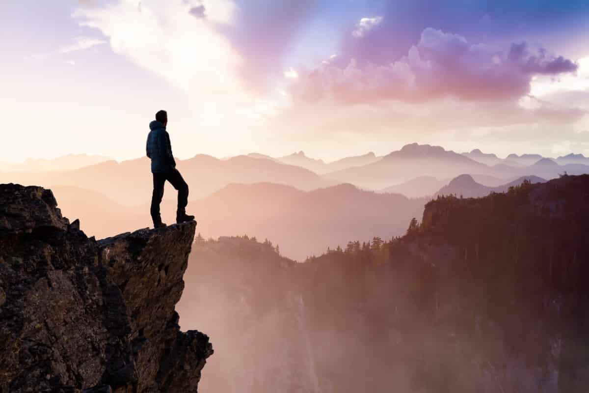 A person standing on a cliff in British Columbia.