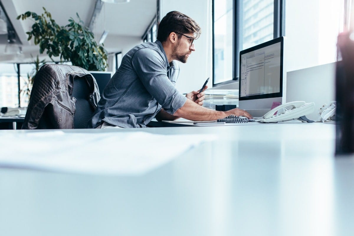 IT worker on computer