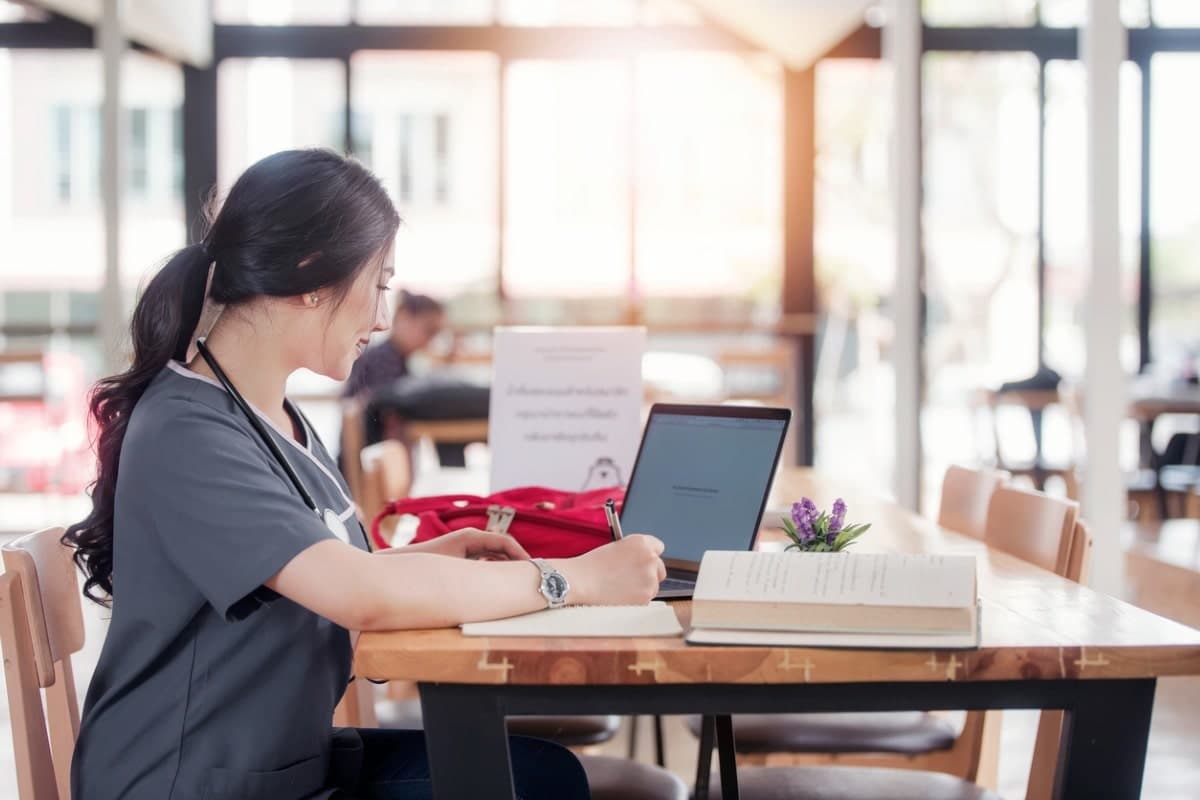 Student working at laptop