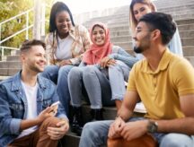friends in university or college bonding in a fun social conversation