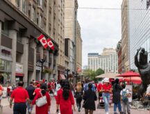 Sparks street with walking people in red clothes in downtown