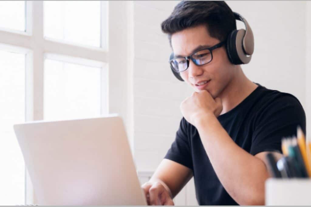 man lookin at screen