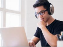 man lookin at screen