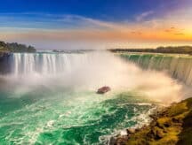 A picture of a boat approaching the horseshoe of Niagara Falls