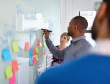 A group of people working in an office in Canada.