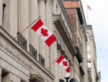 The Canadian flag on a historical building