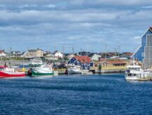 Fishing boats at docks in the villages' harbours in Bonavista, Newfoundland, Canada