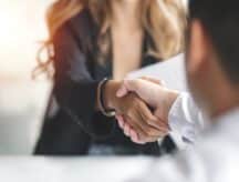 Businesswoman handshake and business people. Successful business concept.