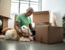 guy playing with a dog