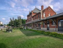 historic brick and limestone train station in the town of Dauphin, Manitoba