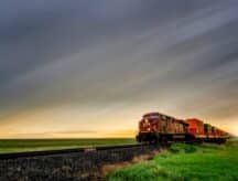A train speeding through Manitoba.