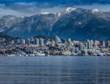 Rocky Mountains and buildings in North Vancouver, British Colombia, Canada.